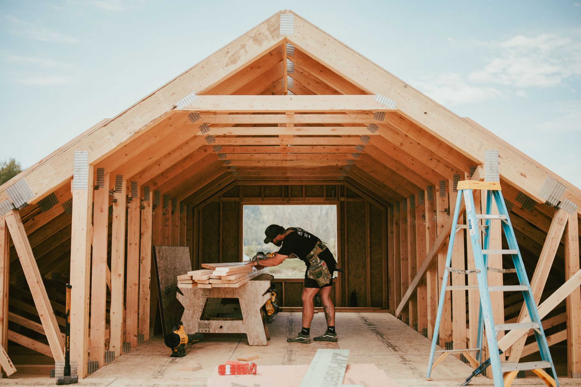 The gable framing and an open window toward the valley